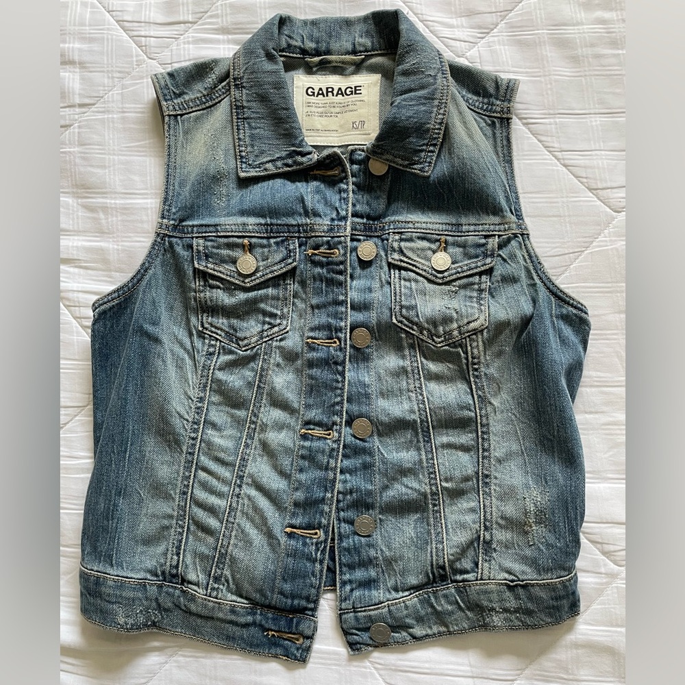 Distressed denim vest